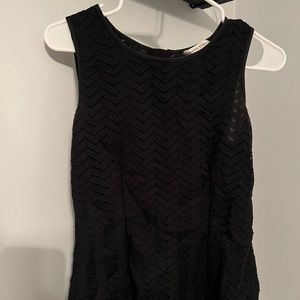 Black sleeveless blouse